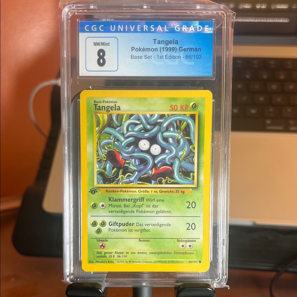 Pokemon Tangela Trading Card - Yellow and Green
